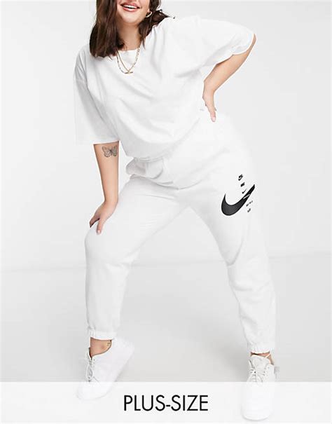 nike oversized jogginghose mit swoosh in weiß|jogginghose damen hoch.